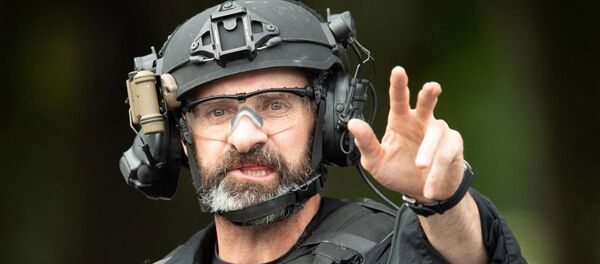 Полиция Новой Зеландии на месте стрельбы в мечети, 15 марта 2019 года Полиция Новой Зеландии на месте стрельбы в мечети, 15 марта 2019 года - Sputnik Lietuva