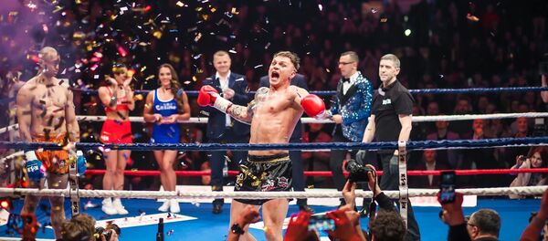 Поединок литовского кикбоксера СергеяМаслобоева и британца Фрэйзера Вейтмана на KOK World Championship 2019 in Vilnius, 16 марта 2019 Поединок литовского кикбоксера СергеяМаслобоева и британца Фрэйзера Вейтмана на KOK World Championship 2019 in Vilnius, 16 марта 2019 - Sputnik Литва