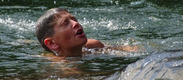 Человек в воде - Sputnik Литва