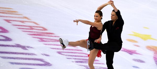 Литовские фигуристы Эллисон Рид и Саулюс Амбрулевичюс, архивное фото - Sputnik Литва
