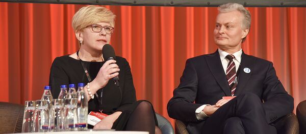 Кандидаты на пост Президента Литвы Ингрида Шимоните и Гитанас Науседа, архивное фото Кандидаты на пост Президента Литвы Ингрида Шимоните и Гитанас Науседа, архивное фото - Sputnik Литва