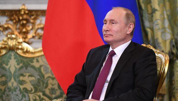 Президент РФ Владимир Путин 3 апреля 2019 года - Sputnik Литва
