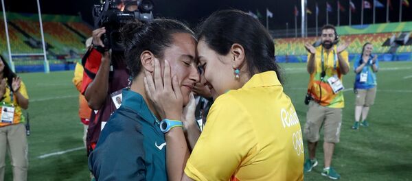 Игрок бразильской сборной по регби Исадора Церулло и ее подруга Марджори Энья Игрок бразильской сборной по регби Исадора Церулло и ее подруга Марджори Энья - Sputnik Lietuva