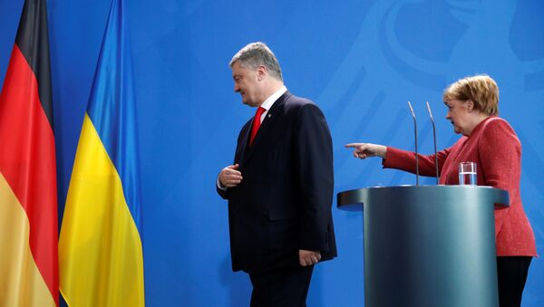 Канцлер Германии Ангела Меркель и президент Украины Петр Порошенко на пресс-конференции в Берлине, 12 апреля 2019 года - Sputnik Литва