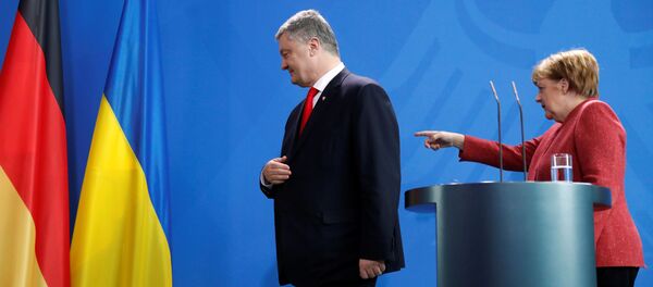 Канцлер Германии Ангела Меркель и президент Украины Петр Порошенко на пресс-конференции в Берлине, 12 апреля 2019 года - Sputnik Литва