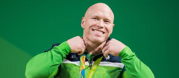 Литовский тяжелоатлет Ауримас Диджбалис на Олимпийских играх в Рио, архивное фото - Sputnik Литва