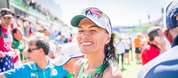 Литовская бегунья Диана Лобачевске на Олимпийских играх в Рио Литовская бегунья Диана Лобачевске на Олимпийских играх в Рио - Sputnik Литва