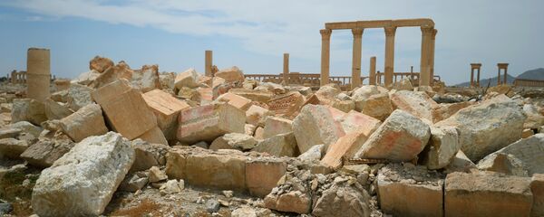 Разрушенный храм Баалшамина в исторической части Пальмиры Разрушенный храм Баалшамина в исторической части Пальмиры - Sputnik Lietuva
