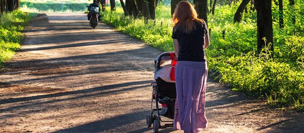 Женщина с коляской, архивное фото - Sputnik Литва