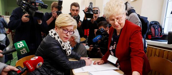 Кандидат в президенты Литвы от партии консерваторов Ингрида Шимоните, 12 мая 2019 года Кандидат в президенты Литвы от партии консерваторов Ингрида Шимоните, 12 мая 2019 года - Sputnik Литва