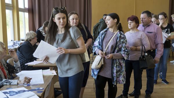 Избиратели голосуют на выборах президента Литвы, 12 мая 2019 года - Sputnik Lietuva
