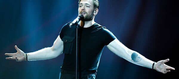 Певец Юриюс (Литва) во время репетиции второго полуфинала международного конкурса Евровидение-2019 Певец Юриюс (Литва) во время репетиции второго полуфинала международного конкурса Евровидение-2019 - Sputnik Lietuva