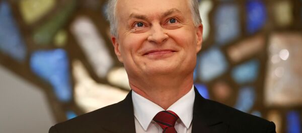 Новоизбранный президент Литвы Гитанас Науседа улыбается во время пресс-конференции в Вильнюсе, Литва, 27 мая 2019 года Новоизбранный президент Литвы Гитанас Науседа улыбается во время пресс-конференции в Вильнюсе, Литва, 27 мая 2019 года - Sputnik Lietuva