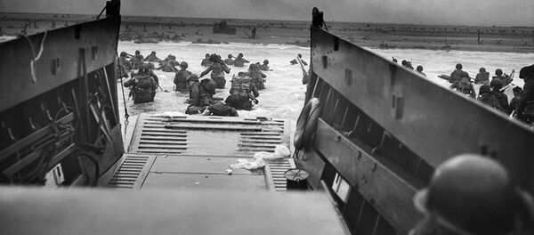 Высадка войск американской 1-й пехотной дивизии. Пляж Омаха, утро 6 июня 1944 года, архивное фото Высадка войск американской 1-й пехотной дивизии. Пляж Омаха, утро 6 июня 1944 года, архивное фото - Sputnik Lietuva
