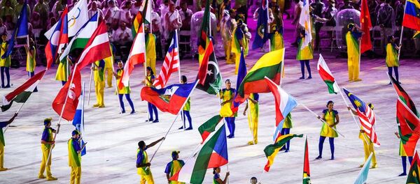 Литовский флаг на закрытии Олимпиады в Рио Литовский флаг на закрытии Олимпиады в Рио - Sputnik Литва