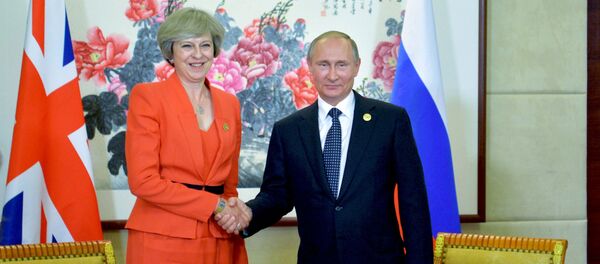 Tereza Mei ir Vladimiras Putinas Tereza Mei ir Vladimiras Putinas - Sputnik Lietuva