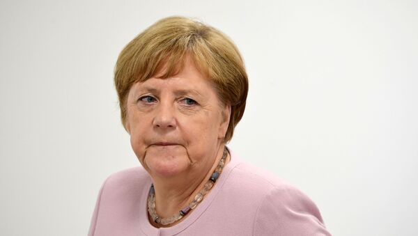 Федеральный канцлер Германии Ангела Меркель во время встречи на саммите Большой двадцатки в Осаке - Sputnik Литва