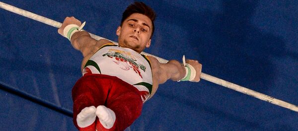 Роберт Творогал (Литва) выполняет упражнение на перекладине в финале соревнований по спортивной гимнастике среди мужчин на II Европейских играх в Минске, 30 июня 2019 года - Sputnik Литва