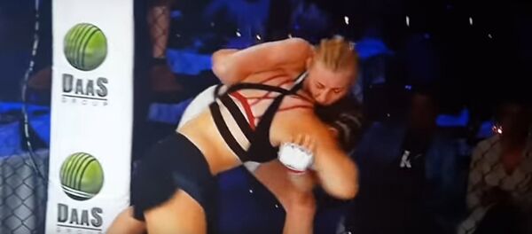 Литовка Столяренко удушила соперницу из Польши за полминуты Литовка Столяренко удушила соперницу из Польши за полминуты - Sputnik Литва