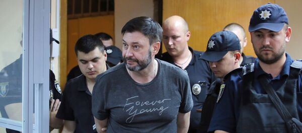 Руководитель портала РИА Новости Украина Кирилл Вышинский на заседании Подольского районного суда Киева - Sputnik Lietuva