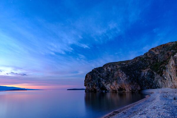 Закат с острова Ольхон на озере Байкал в Иркутской области - Sputnik Lietuva