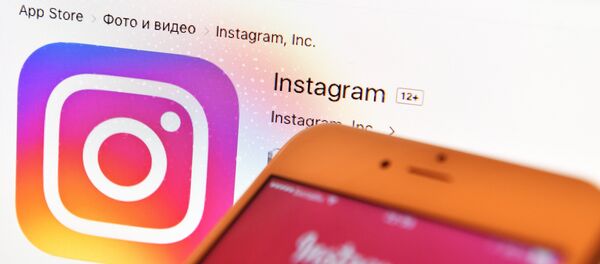Иконка социальной сети Instagram, архивное фото Иконка социальной сети Instagram, архивное фото - Sputnik Lietuva