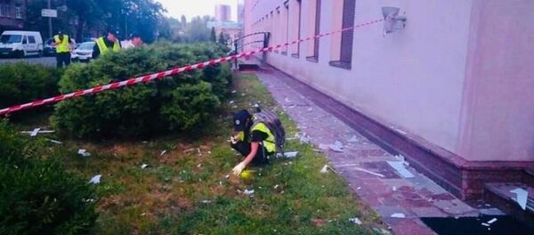 Полиция Киева у здания телеканала 112 Украина, которое обстреляли из гранатомета, 13 июля 2019 - Sputnik Литва