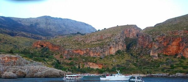 Литовские пограничники спасли десять человек в Италии - Sputnik Литва