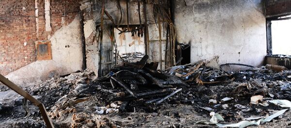 В обгоревшем здании Мариупольского городского совета, архивное фото - Sputnik Литва