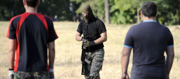 Члены националистического батальона Азов в Мариуполе, архивное фото - Sputnik Литва