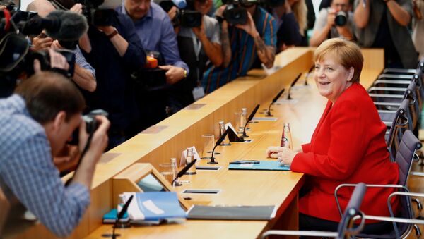 Канцлер Германии Ангела Меркель проводит ежегодную летнюю пресс-конференцию в Берлине, 19 июля 2019 года - Sputnik Литва