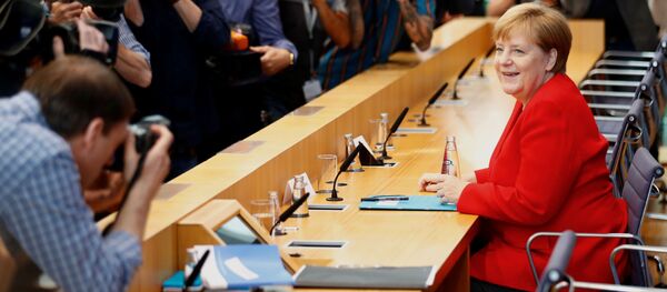 Канцлер Германии Ангела Меркель проводит ежегодную летнюю пресс-конференцию в Берлине, 19 июля 2019 года - Sputnik Литва