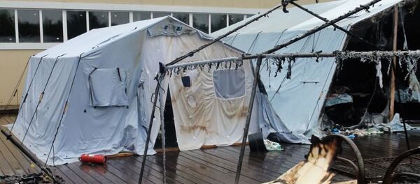 Последствия пожара на территории горнолыжного комплекса Холдоми в Солнечном районе в палаточном городке, 23 июля 2019 года Последствия пожара на территории горнолыжного комплекса Холдоми в Солнечном районе в палаточном городке, 23 июля 2019 года - Sputnik Литва