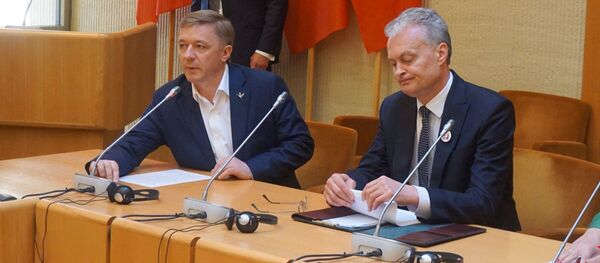 Гитанас Науседа и Рамунас Карбаускис, архивное фото Гитанас Науседа и Рамунас Карбаускис, архивное фото - Sputnik Литва