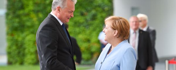 Президент Литвы Гитанас Науседа и Федеральный канцлер Германии Ангела Меркель, архивное фото - Sputnik Литва