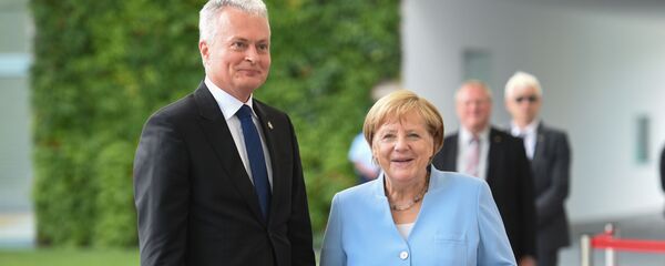 Президент Литвы Гитанас Науседа и Федеральный канцлер Германии Ангела Меркель, архивное фото Президент Литвы Гитанас Науседа и Федеральный канцлер Германии Ангела Меркель, архивное фото - Sputnik Lietuva